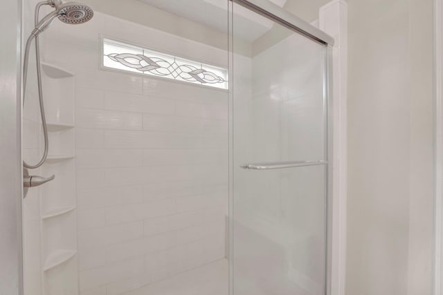 bathroom with a stall shower
