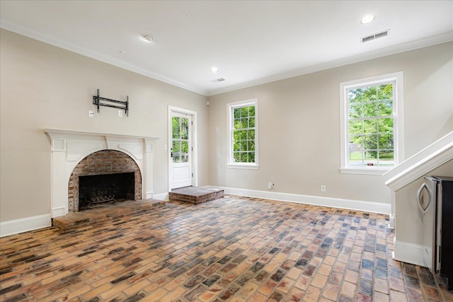 3537 Oakley Ave, Memphis, TN 38111 - unfurnished living room with baseboards, plenty of natural light, brick floor, and visible vents