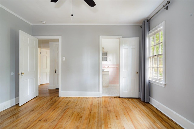 3537 Oakley Ave, Memphis, TN 38111 - unfurnished bedroom with crown molding, baseboards, and wood finished floors