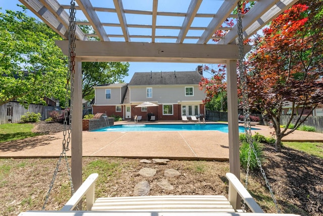 view of pool featuring a pergola, a fenced in pool, a patio, and a fenced backyard