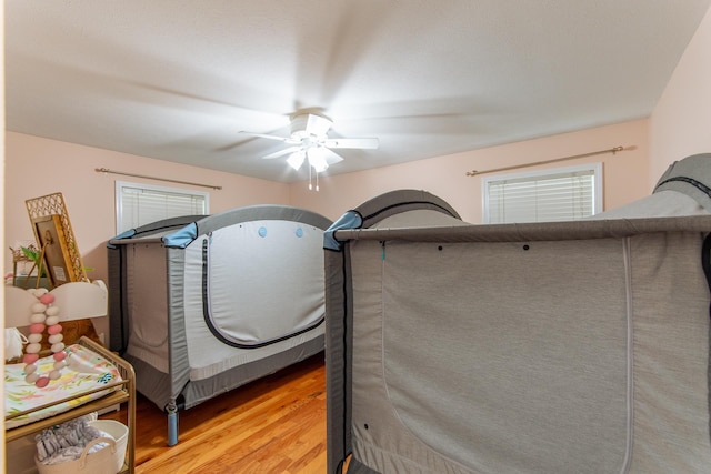 bedroom featuring ceiling fan and light wood finished floors