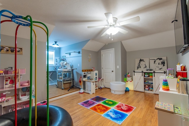 recreation room featuring ceiling fan and wood finished floors