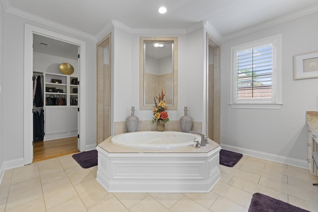 full bathroom featuring tile patterned floors, ornamental molding, a walk in closet, and a bath