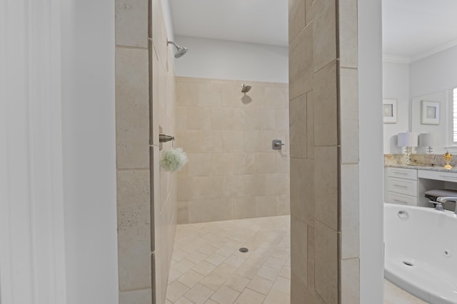 bathroom with crown molding, a tile shower, a tub with jets, and vanity