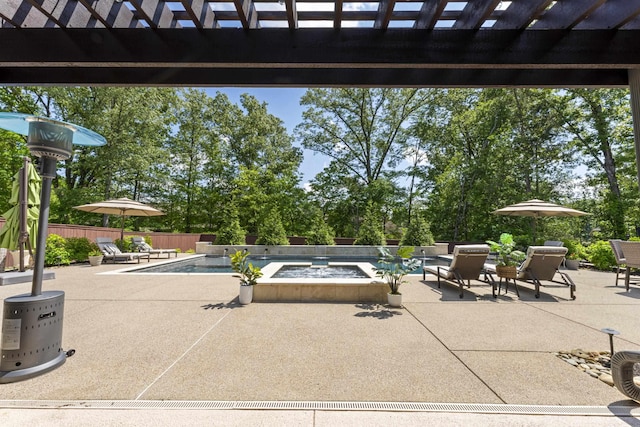 view of patio / terrace featuring a fenced in pool and a pergola