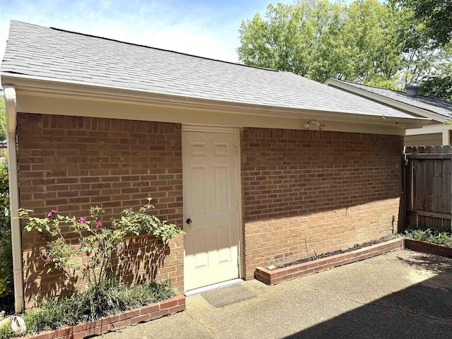 6905 Petworth Rd Unit 6905, Memphis, TN 38119 - property entrance with brick siding, roof with shingles, and fence