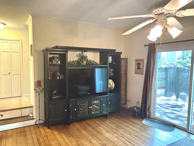 6905 Petworth Rd Unit 6905, Memphis, TN 38119 - living area featuring hardwood / wood-style floors, a ceiling fan, and crown molding