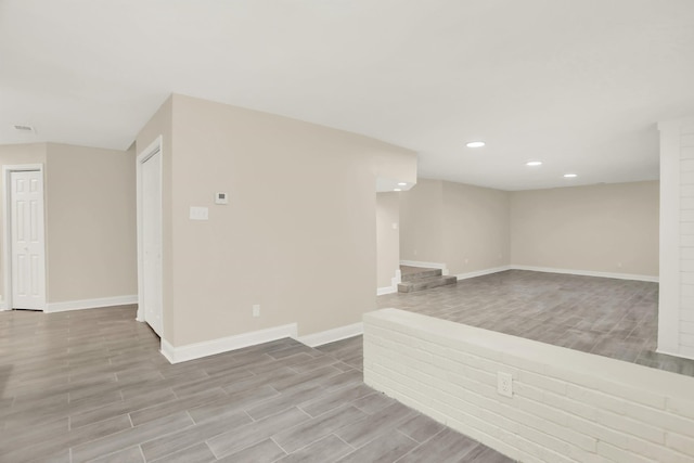 1296 Monasco Rd, Millington, TN 38053 - empty room featuring baseboards, recessed lighting, wood finished floors, and visible vents