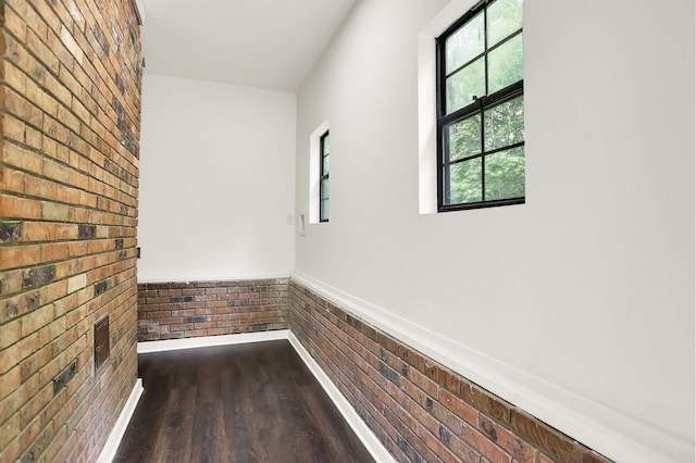 1296 Monasco Rd, Millington, TN 38053 - interior space featuring brick wall and wood finished floors