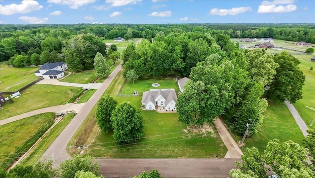 bird's eye view with a forest view