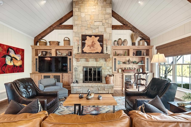 1055 Tides Ridge Cv, Memphis, TN 38120 - living room with wood finished floors, wood walls, lofted ceiling, and a fireplace