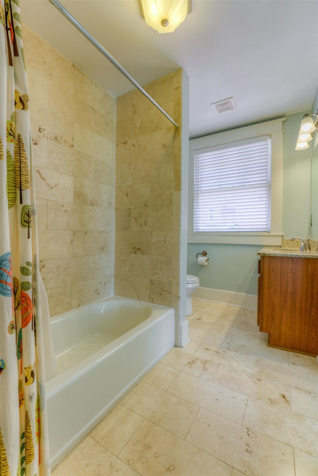 bathroom featuring vanity, toilet, tile patterned floors, shower / bathtub combination with curtain, and visible vents