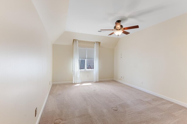7298 Mont Blanc Dr, Germantown, TN 38138 - empty room featuring a ceiling fan, visible vents, baseboards, lofted ceiling, and carpet flooring