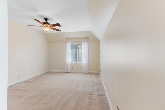 7298 Mont Blanc Dr, Germantown, TN 38138 - bonus room with baseboards, ceiling fan, vaulted ceiling, and light colored carpet
