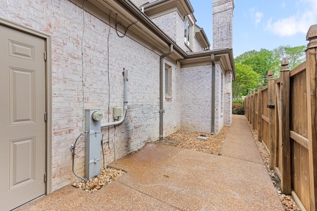 7298 Mont Blanc Dr, Germantown, TN 38138 - view of property exterior with fence and a chimney