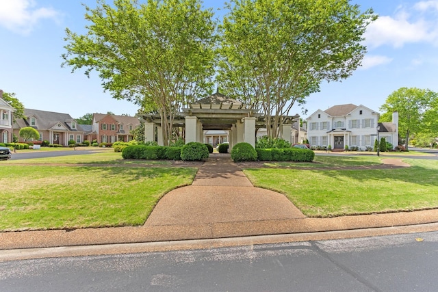 7298 Mont Blanc Dr, Germantown, TN 38138 - view of front facade featuring stucco siding, a front yard, and a residential view