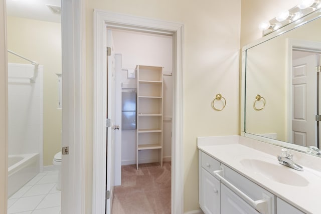7298 Mont Blanc Dr, Germantown, TN 38138 - full bath featuring vanity, baseboards, a spacious closet, and toilet
