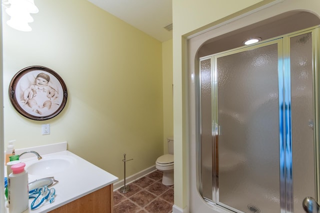 4265 Charlie Pounds Rd, Stantonville, TN 38379 - full bath featuring vanity, toilet, baseboards, tile patterned floors, and a shower stall