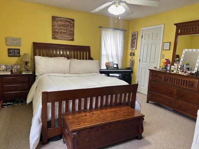 85 Two Boys Rd, Savannah, TN 38372 - bedroom featuring light carpet and ceiling fan