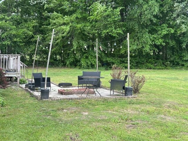 85 Two Boys Rd, Savannah, TN 38372 - view of green lawn featuring a patio