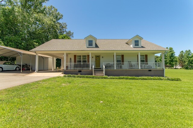 85 Two Boys Rd, Savannah, TN 38372 - view of front of house with covered porch, crawl space, a front lawn, a shingled roof, and concrete driveway