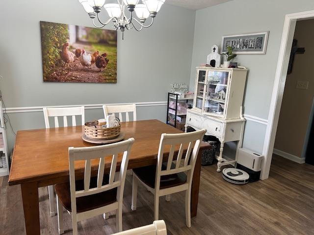 85 Two Boys Rd, Savannah, TN 38372 - dining area with a chandelier and wood finished floors