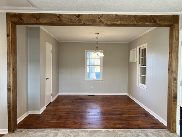 410 Pinhook Dr, Savannah, TN 38372 - unfurnished dining area featuring wood-type flooring, baseboards, and crown molding