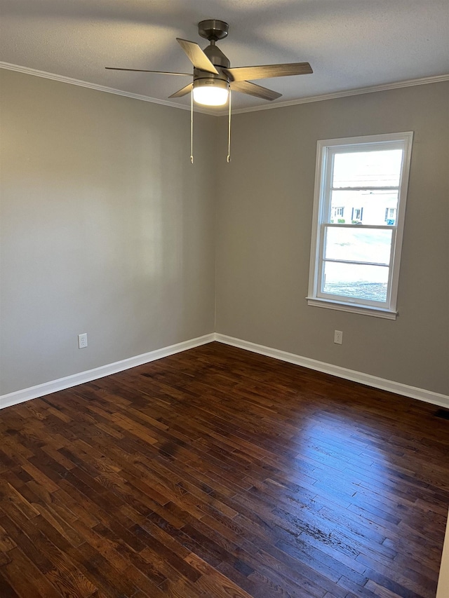 410 Pinhook Dr, Savannah, TN 38372 - spare room with crown molding, a ceiling fan, and dark wood-style flooring