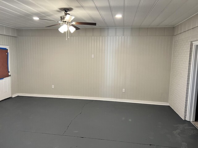 410 Pinhook Dr, Savannah, TN 38372 - empty room featuring baseboards, ceiling fan, and concrete flooring