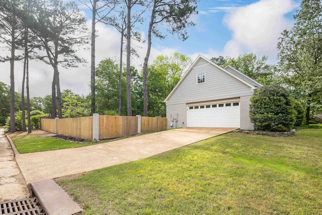 view of side of home with fence, brick siding, a garage, concrete driveway, and a yard