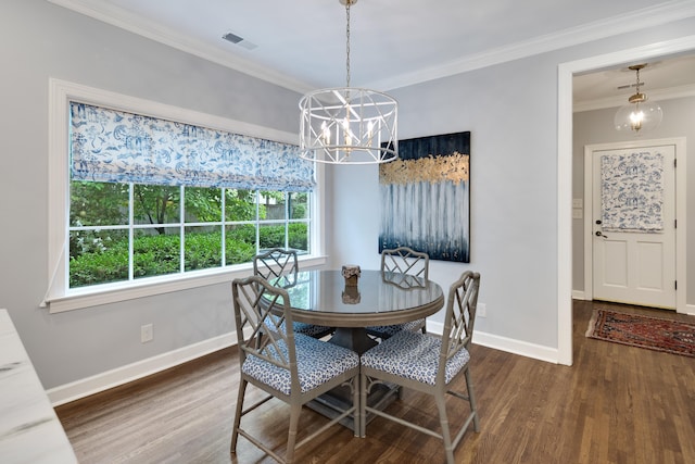 dining space featuring baseboards, an inviting chandelier, wood finished floors, and visible vents