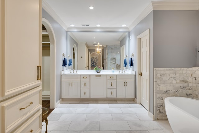 full bath featuring double vanity, ornamental molding, a sink, and a shower stall