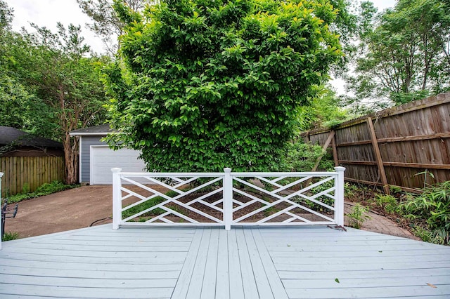2009 Linden Ave, Memphis, TN 38104 - wooden terrace with an outdoor structure, a garage, and fence