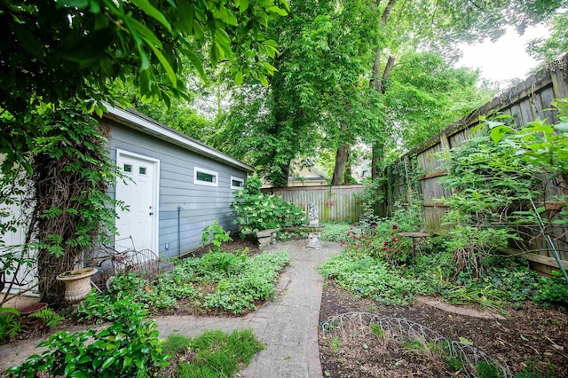2009 Linden Ave, Memphis, TN 38104 - view of yard featuring a fenced backyard and an outbuilding