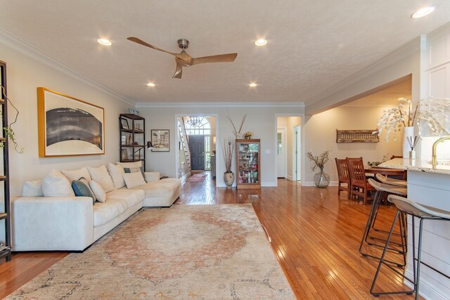 164B Aquaticview Way, Savannah, TN 38372 - living area featuring crown molding, ceiling fan, recessed lighting, and hardwood / wood-style floors