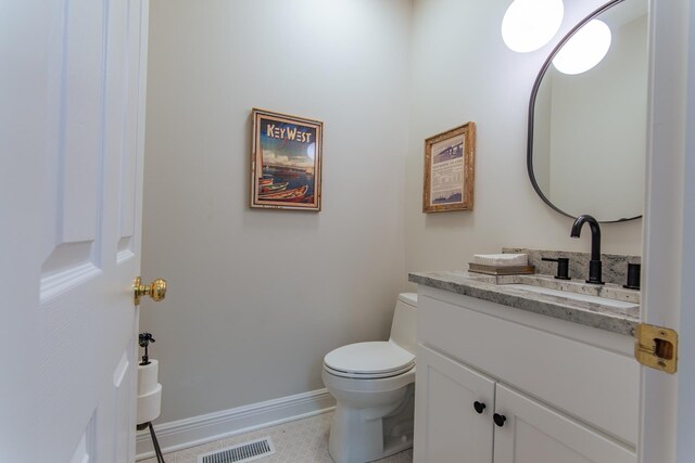 164B Aquaticview Way, Savannah, TN 38372 - half bath with visible vents, tile patterned flooring, vanity, toilet, and baseboards