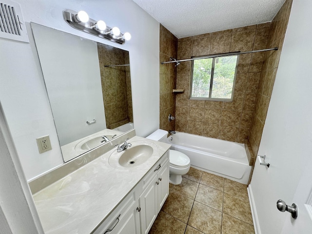 bathroom featuring shower / bathing tub combination, a textured ceiling, tile patterned flooring, vanity, and toilet