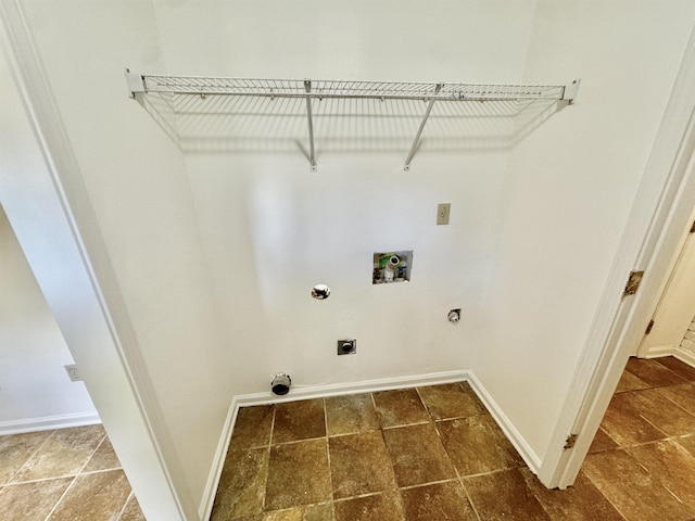 clothes washing area featuring baseboards, laundry area, electric dryer hookup, and hookup for a washing machine