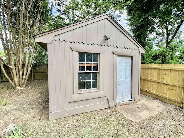 view of shed with a fenced backyard