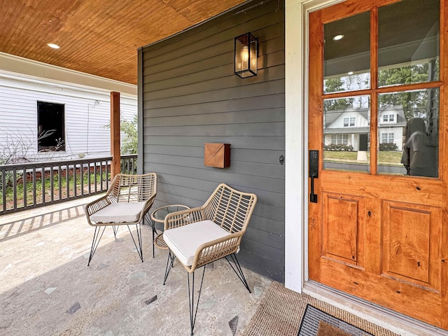 property entrance with covered porch