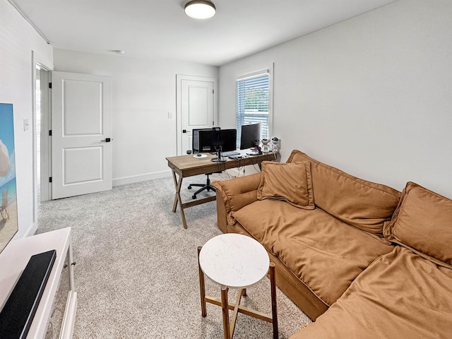 office area with baseboards and light colored carpet