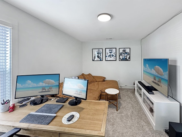 living room with baseboards, carpet, and visible vents