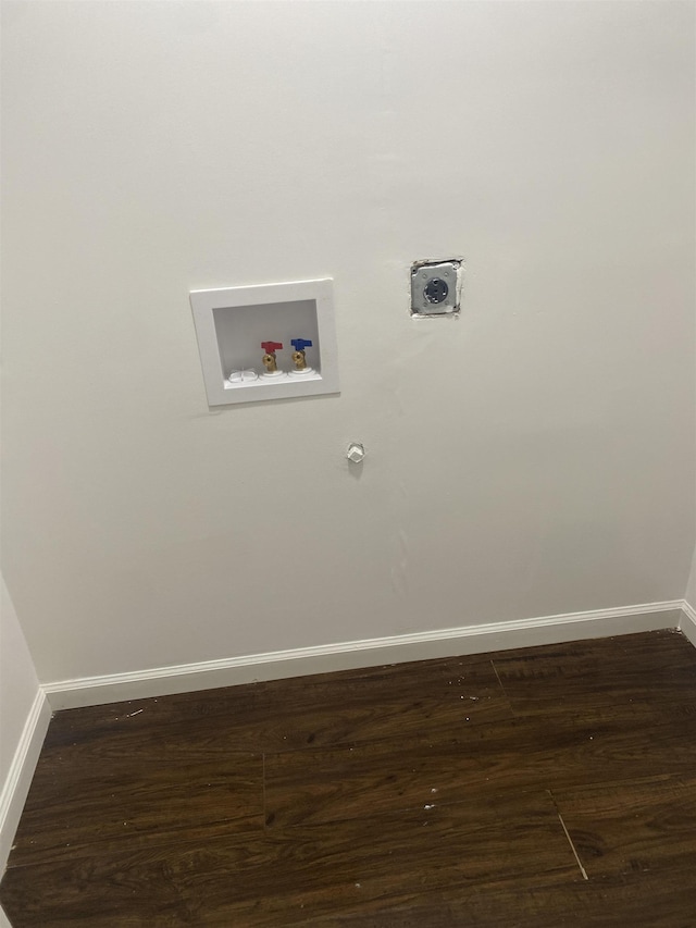 laundry room featuring laundry area, washer hookup, baseboards, and electric dryer hookup