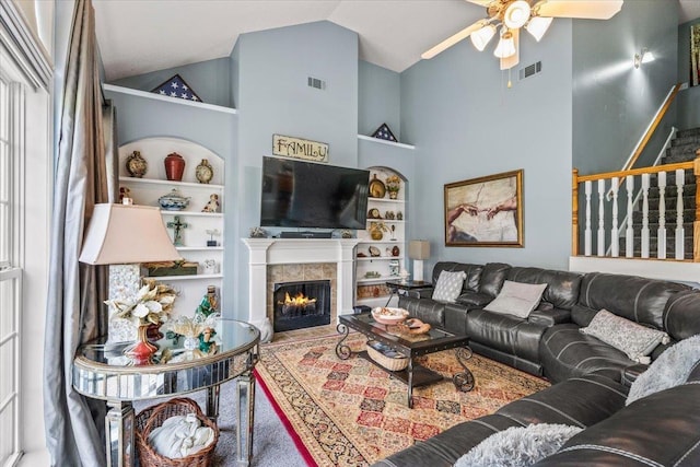 235 Fairoaks Dr, Oakland, TN 38060 - living area with visible vents, built in features, ceiling fan, and a tile fireplace