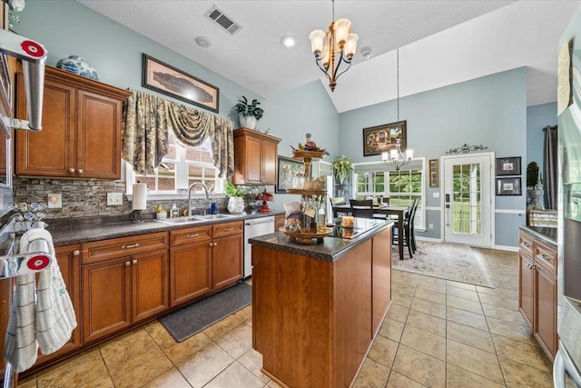 235 Fairoaks Dr, Oakland, TN 38060 - kitchen with an inviting chandelier, a kitchen island, a sink, and visible vents