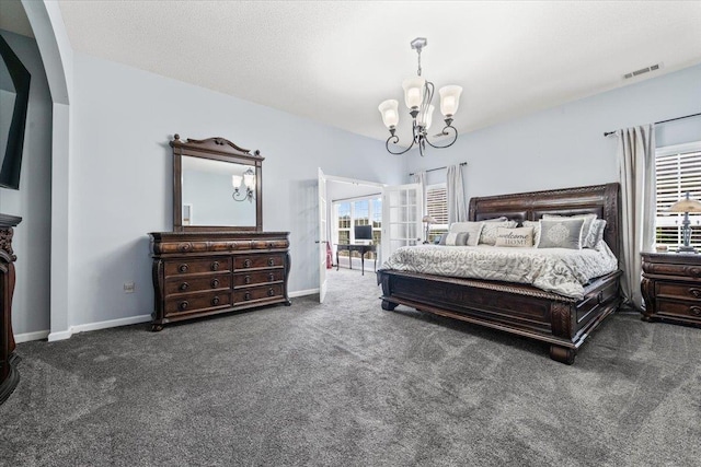 235 Fairoaks Dr, Oakland, TN 38060 - carpeted bedroom featuring arched walkways, baseboards, a chandelier, and visible vents