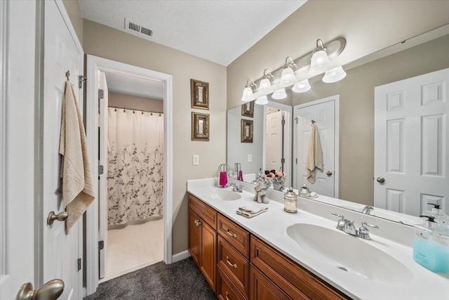 235 Fairoaks Dr, Oakland, TN 38060 - bathroom featuring a sink, double vanity, and visible vents