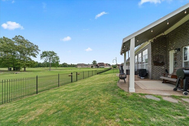 235 Fairoaks Dr, Oakland, TN 38060 - view of yard featuring a patio and a fenced backyard