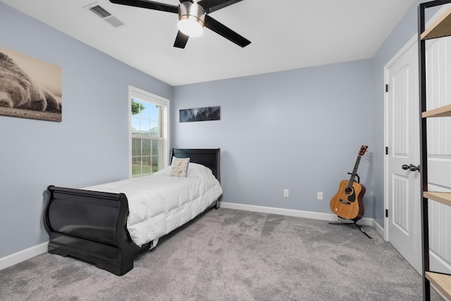 bedroom with baseboards, ceiling fan, carpet, and visible vents