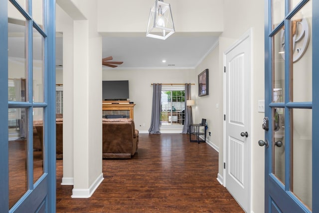 entrance foyer featuring crown molding, wood finished floors, baseboards, recessed lighting, and a ceiling fan